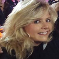 Kristina Reid Photo 37