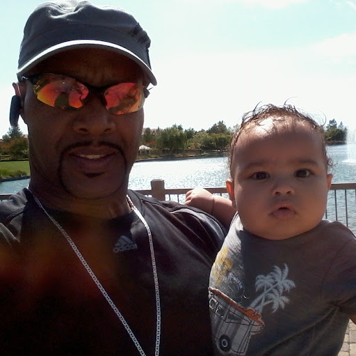 Dennis Mitchell Photo 22