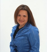 Claudia Gonzalez Photo 12